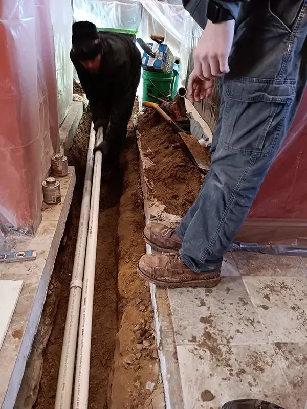 Hanna techs on an emergency line replacement call