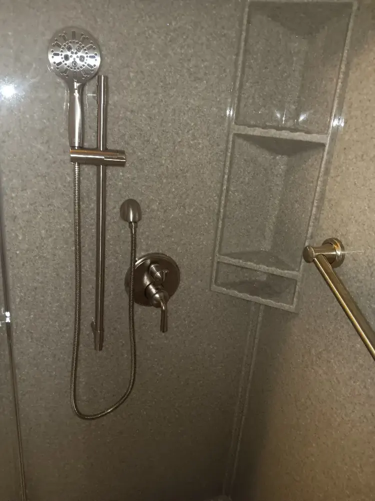 Custom tiled walk-in shower built by Hanna Plumbing & Heating in Marion, Iowa